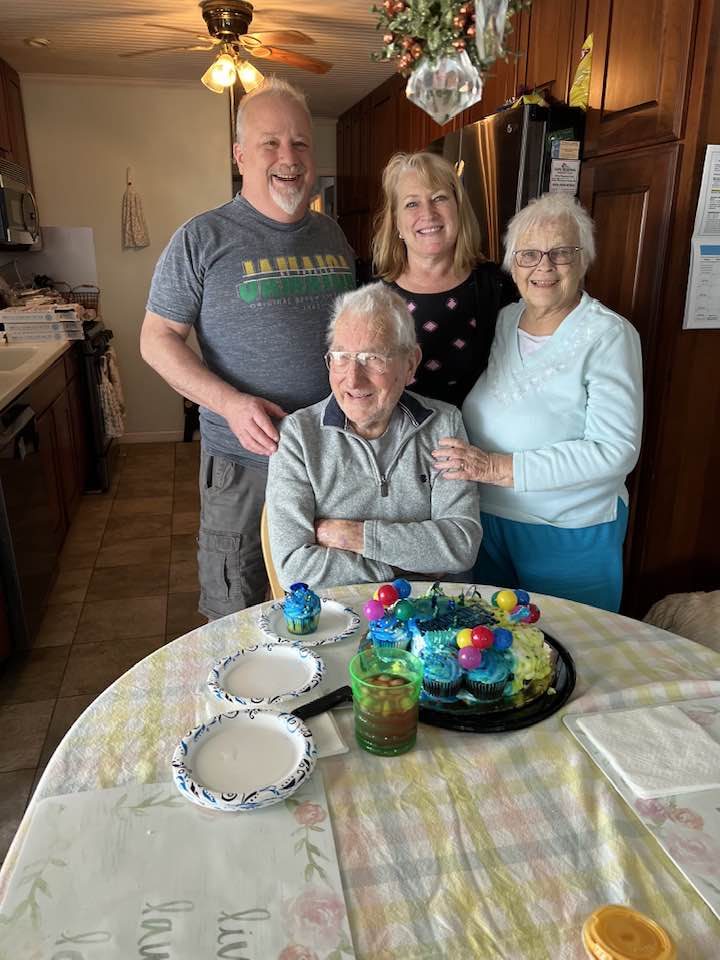 Don with family around a kitchen table