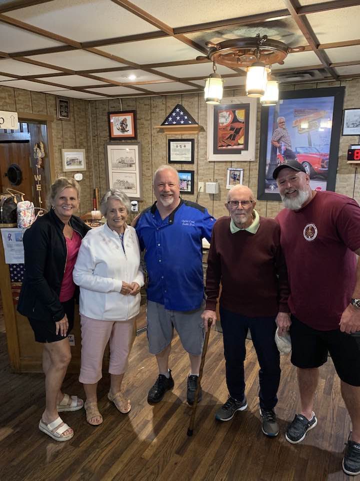 Chef Don with guests at Oyster Creek